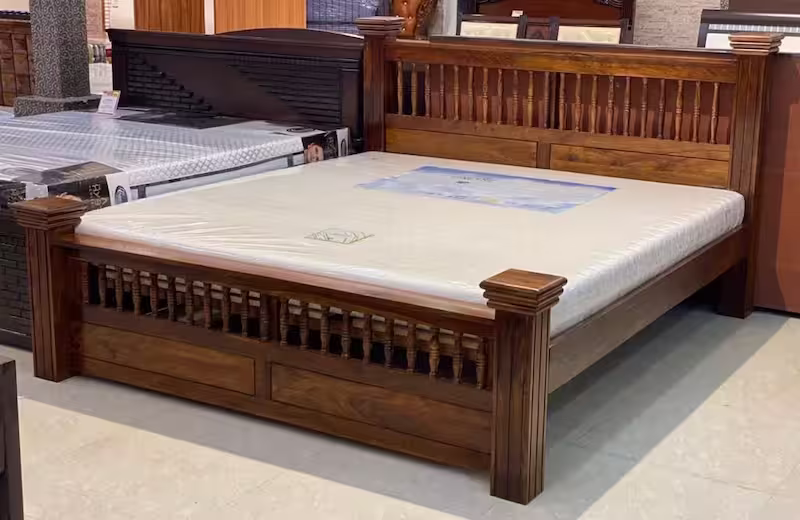 Heavy duty teak wood bed with vertical slat headboard and traditional pillar corner design