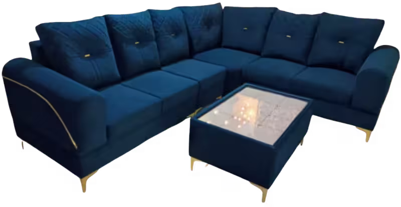 Royal blue velvet L-shaped sectional sofa with gold trim and center table